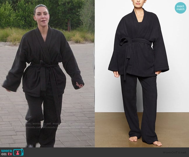 Skims Fleece Wrap Belted Jacket worn by Kim Kardashian (Kim Kardashian) on The Kardashians