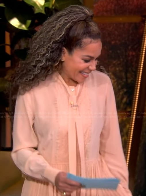 Sunny’s pink tie neck dress on The View