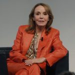Sylvie’s red metallic blazer and pants on Emily in Paris