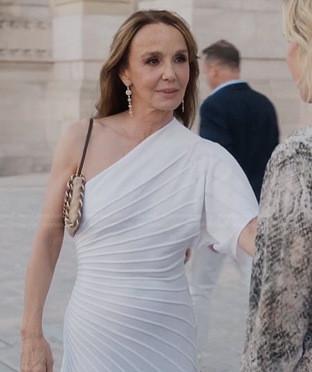 Sylvie’s white pleated one shoulder dress on Emily in Paris