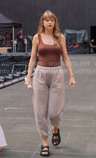 Taylor Swift’s brown tank top and TTPD sweatpants on The End of an Era