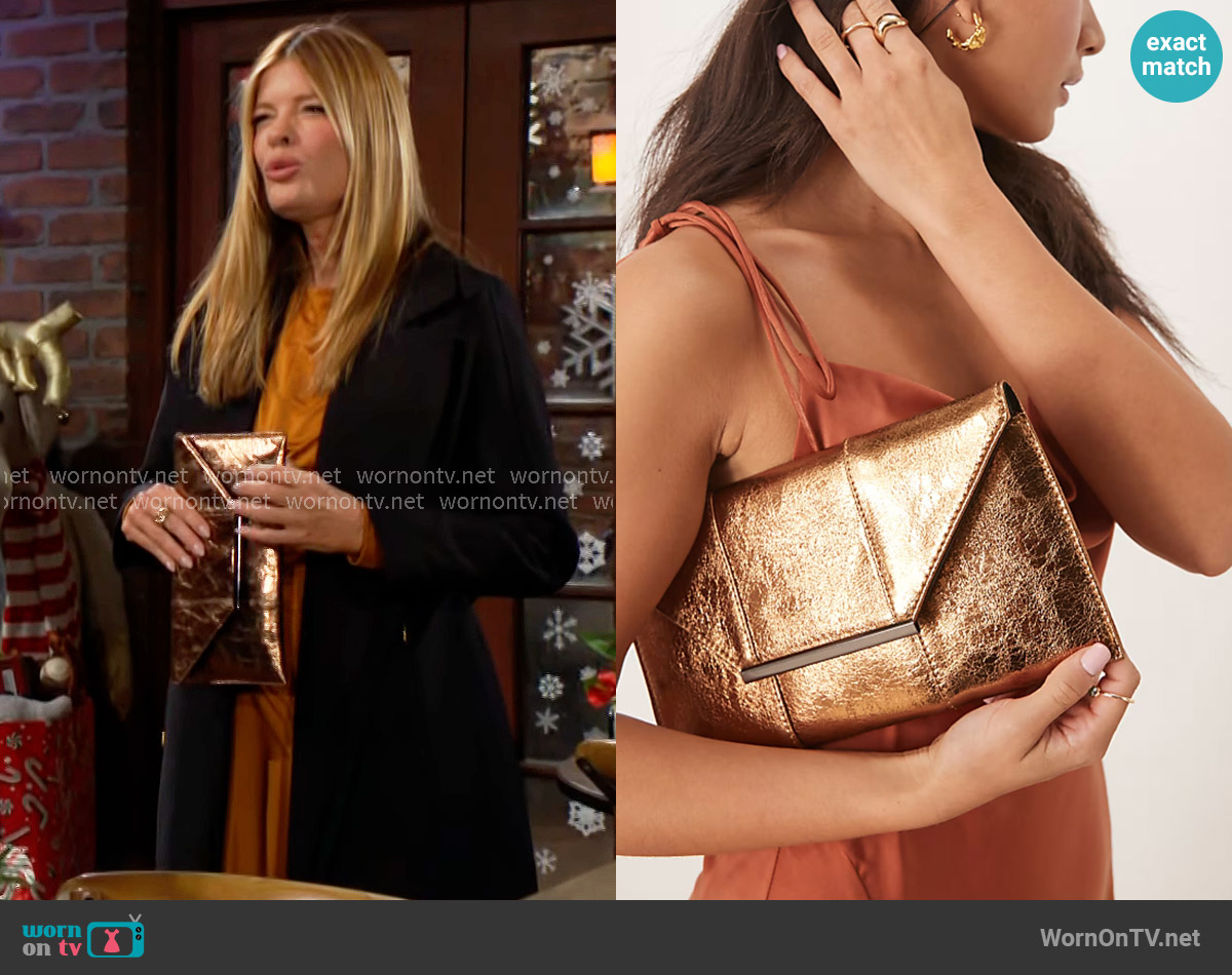 True Decadence Metallic clutch bag in bronze worn by Phyllis Summers (Michelle Stafford) on The Young and the Restless