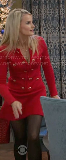 Vanessa’s red dress with heart buttons on Beyond the Gates