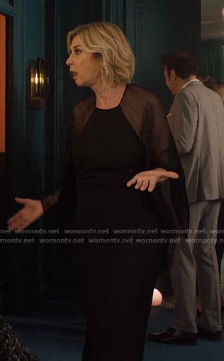 Yvette’s black chiffon dress on Emily in Paris