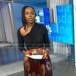 Zinhle’s black asymmetric top and print pleated skirt on NBC News Daily