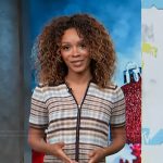 Zuri’s striped polo sweater on Access Hollywood