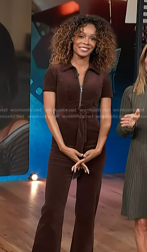 Zuri’s brown corduroy belted jumpsuit on Access Hollywood