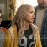 Ava’s 92 tee and yellow cardigan on High Potential