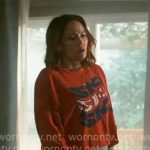 Angie’s red ski graphic tee and striped shorts on Will Trent