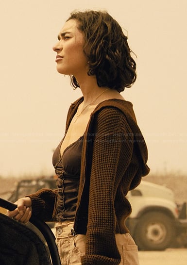Ariana’s brown knit top and cardigan on Landman