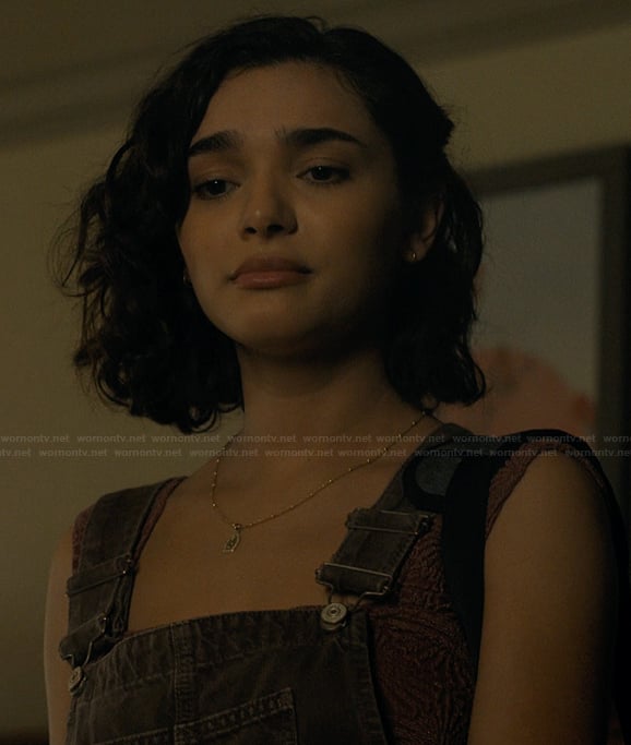Ariana’s knit cami and overalls on Landman