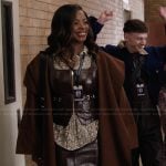 Ava’s printed blouse and leather corset on Abbott Elementary