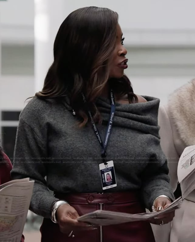 Ava’s gray ring detail sweater on Abbott Elementary