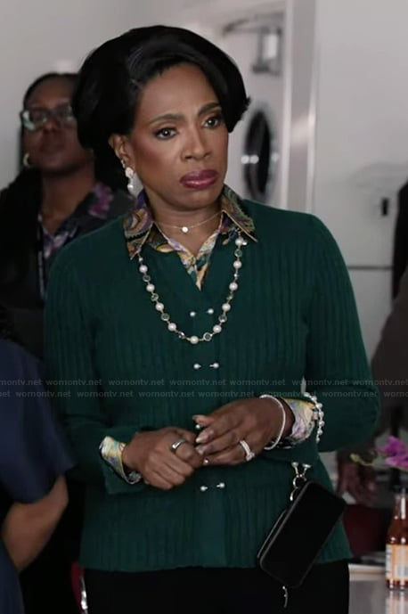 Barbara’s green pearl button cardigan on Abbott Elementary