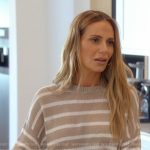 Dorit’s beige striped sweater on The Real Housewives of Beverly Hills