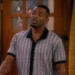 Bernard’s geo print polo on The Upshaws