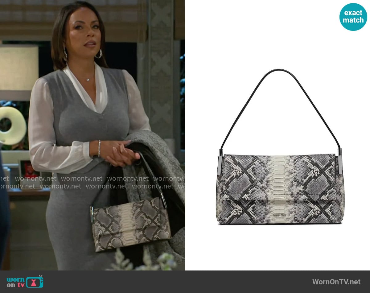 Calvin Klein Verne Flap Demi Shoulder Bag worn by Nicole Dupree Richardson (Daphnee Duplaix) on Beyond the Gates