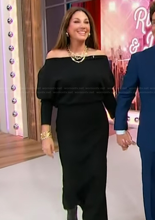 Daisy Fuentes’s black off shoulder sweater dress on Sherri