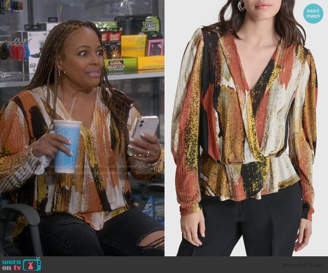 DKNY Print Faux Wrap Peplum Top worn by Regina Upshaw (Kim Fields) on The Upshaws