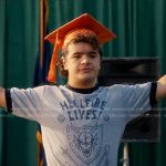 Dustin’s grey Hellfire Lives print tee on Stranger Things