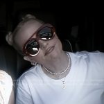 Erika’s red ropund aviator sunglasses on The Real Housewives of Beverly Hills