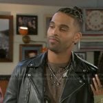 Izaiah’s brown paisley sweater and leather jacket on Beyond the Gates