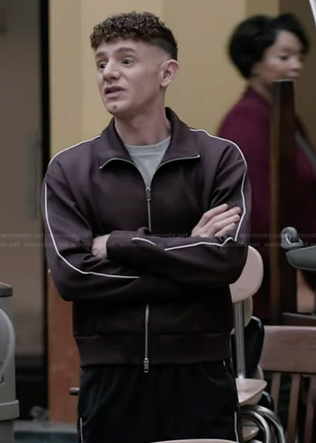 Jacob’s burgundy piping jacket on Abbott Elementary