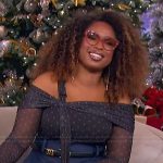 Jennifer’s polka dot cold shoulder top on The Jennifer Hudson Show