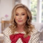Kathy’s white polka dot confessional dress on The Real Housewives of Beverly Hills