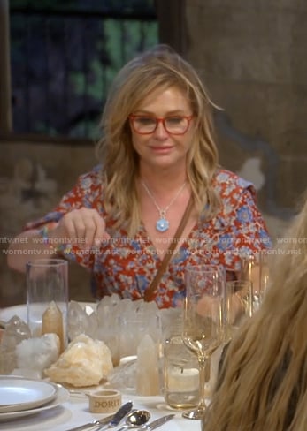 Kathy’s red floral ruffle dress on The Real Housewives of Beverly Hills