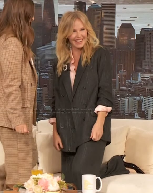 Kelli Giddish’s black pinstripe blazer and pants on The Drew Barrymore Show