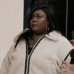 Krystal’s white fleece jacket on Abbott Elementary