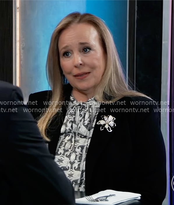 Laura’s black and white printed tie-neck blouse on General Hospital