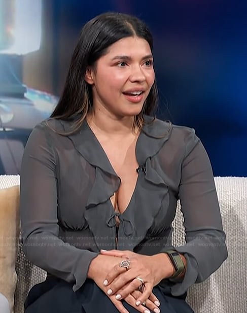 Lisseth Chavez’s gray ruffle front top on Access Hollywood