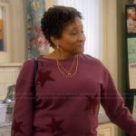 Lucretia’s maroon star sweater on The Upshaws
