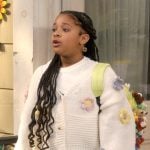 Maya’s white floral knit cardigan on The Upshaws