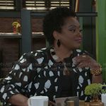 Mona’s black and white jacket on Beyond the Gates