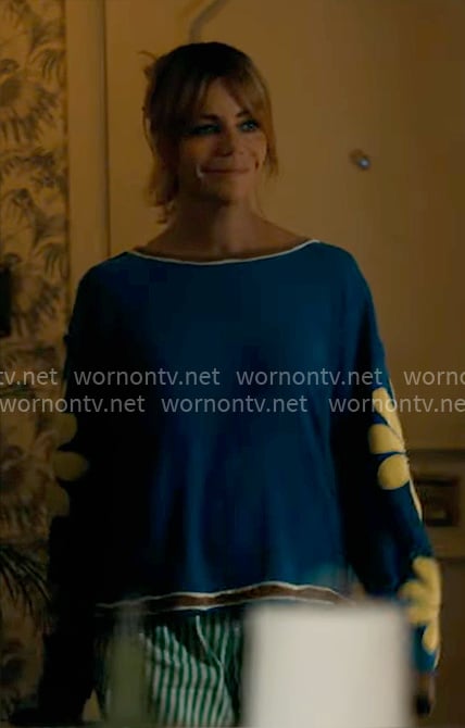 Morgan’s blue top with flower sleeves on High Potential