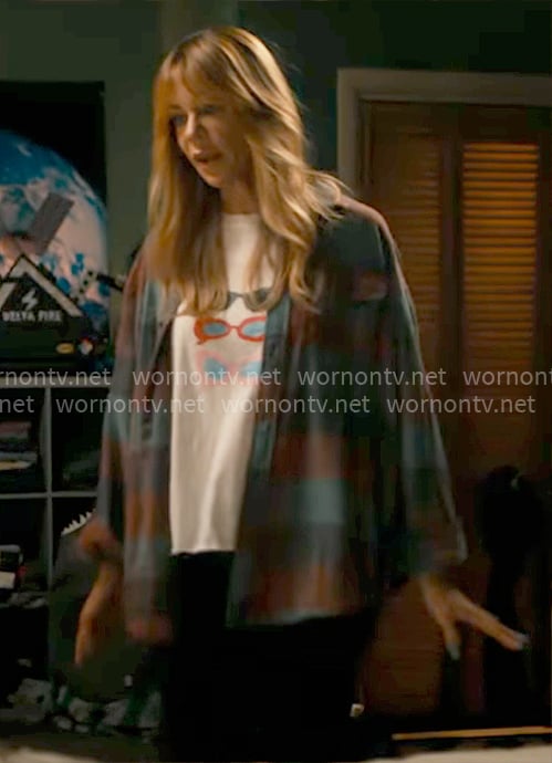 Morgan’s sunglasses graphic tee and checked overshirt on High Potential