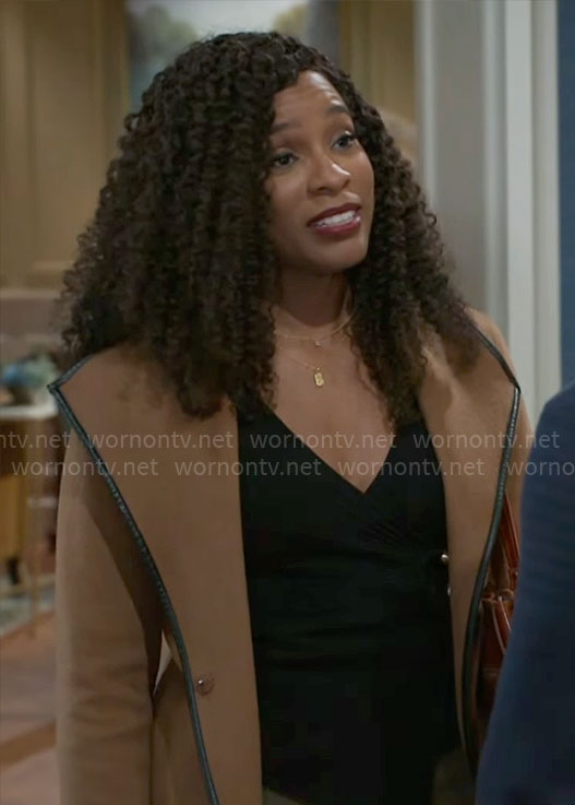 Naomi’s camel coat with leather trim on Beyond the Gates