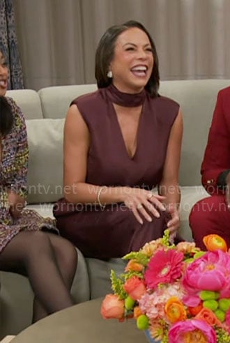 Nicole’s plum jumpsuit with cutout chest on Beyond the Gates