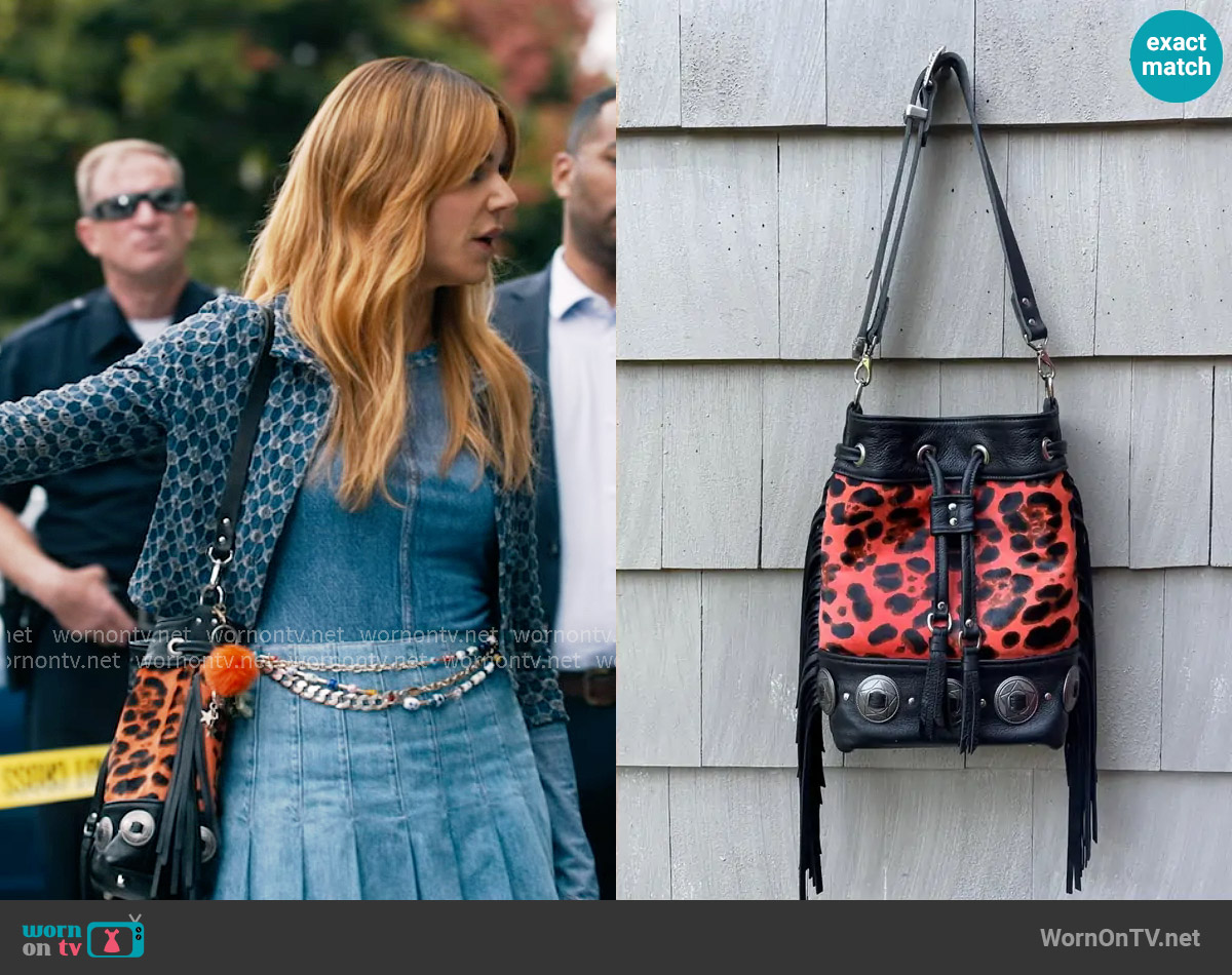 Of The Sun Leather Wild West x Wild Thing Bucket Bag worn by Morgan Gillory (Kaitlin Olson) on High Potential