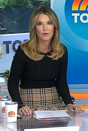 Savannah’s black mesh inset top and beige plaid pleated skirt on Today