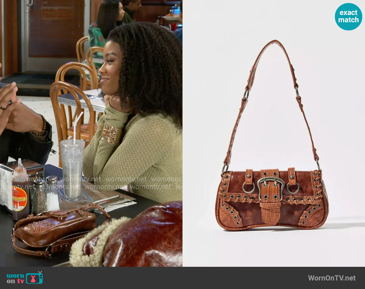 Silence + Noise Jade Laced Rivet Bag worn by Eva Thomas (Ambyr Michelle) on Beyond the Gates