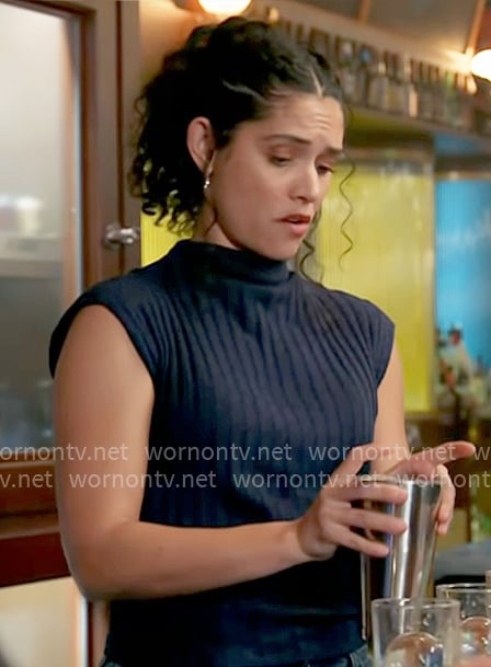 Stella’s navy ribbed sleeveless sweater on Chicago Fire
