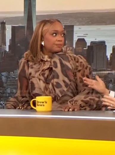 Sunny Anderson’s leopard print tie neck blouse on The Drew Barrymore Show