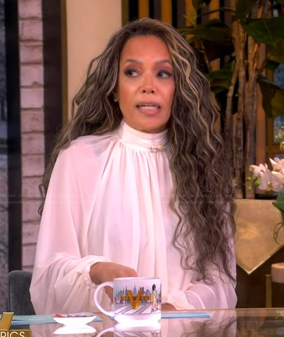 Sunny’s white tie neck blouse on The View