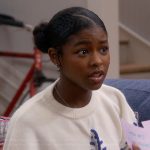 Sydney’s white star whipstitch sweater on The Upshaws