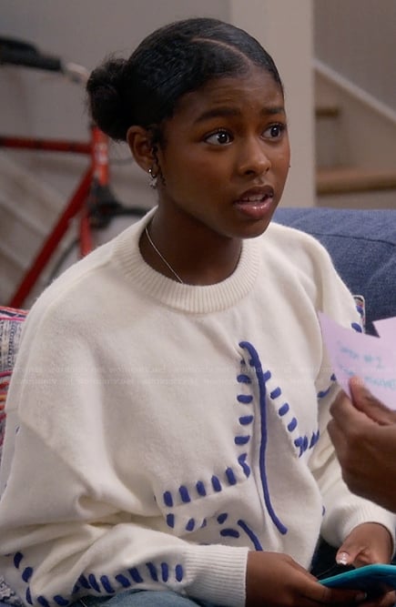 Sydney’s white star whipstitch sweater on The Upshaws