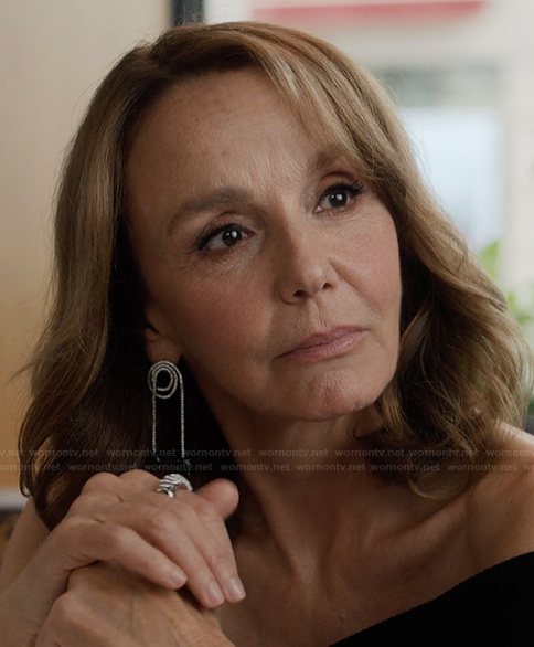 Sylvie’s silver earrings on Emily in Paris